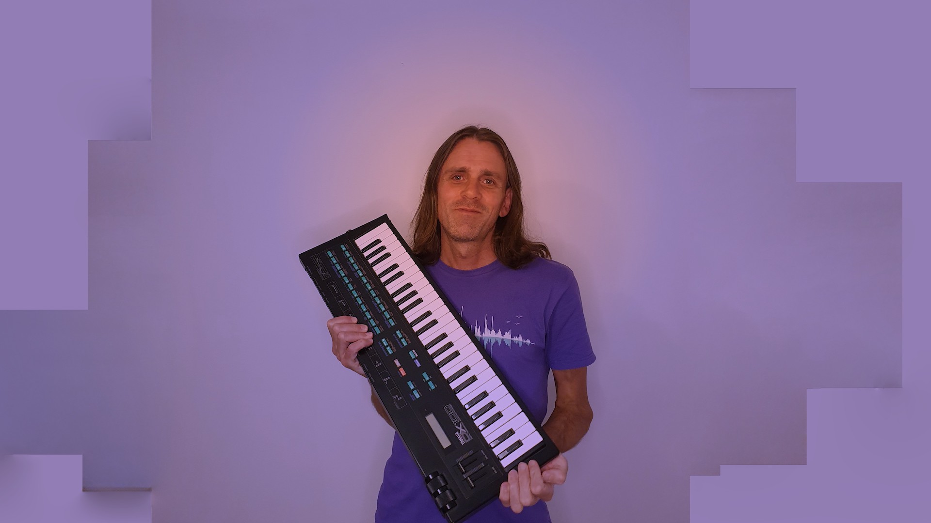 justin mullins posing with a keytar